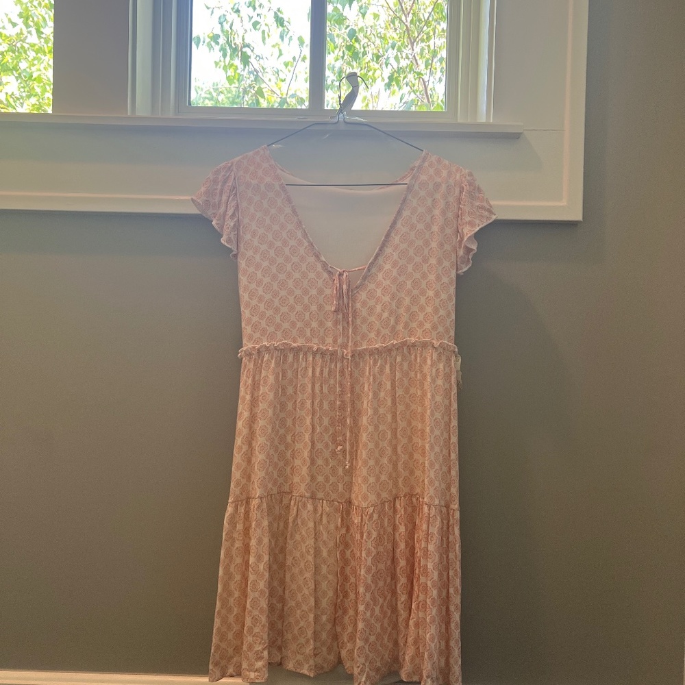 White dress with pink detail